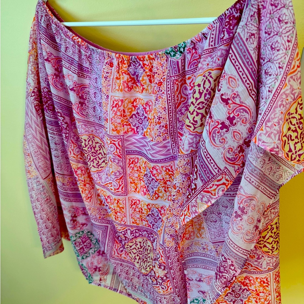 Chicos pink top lined with flouncy sleeves size 1